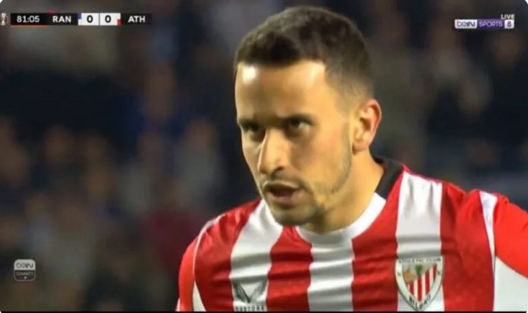 A historic scene unfolds from Rangers fans during a decisive penalty kick taken by an Athletic Bilbao player in the final minutes.