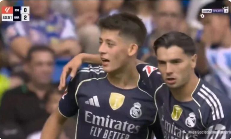 A scene of magic and madness unfolds among Real Madrid players as a sensational goal is announced against Real Sociedad.